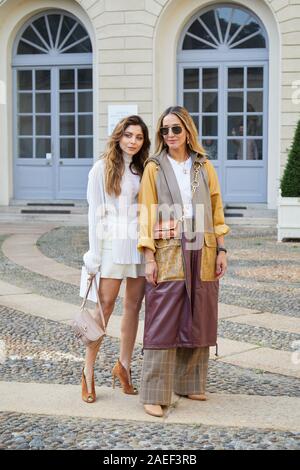 MILAN, ITALY - SEPTEMBER 20, 2019: Guests before Tods fashion show, Milan Fashion Week street style Stock Photo