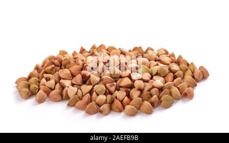 Buckwheat grains pile isolated on white background Stock Photo
