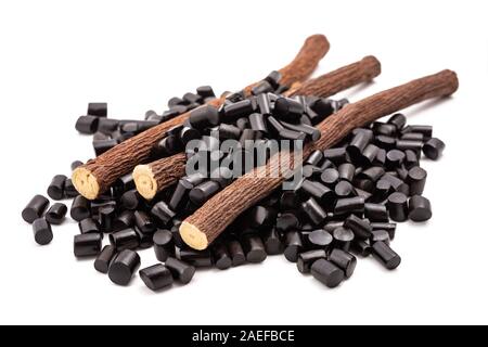 licorice candy and roots  isolated on white background Stock Photo