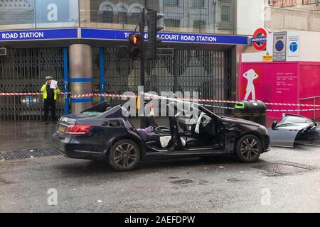 A Mercedes car outside Tottenham Court tube station, having had its doors and roof removed following a crash Stock Photo