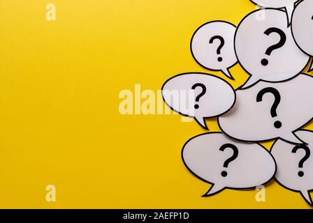 Multiple question marks in speech bubbles with copy space Stock Photo