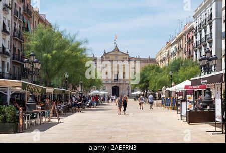 TARRAGONA, SPAIN - JULY 28, 2018: A view of Placa de la Font square in the Part Alta, the Old Town of Tarragona, Spain, with the City Hall in the back Stock Photo