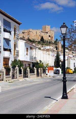 View of the castle on the hill with townhouses in the foreground, Velez Blanco, Almeria Province, Andalucia, Spain. Stock Photo