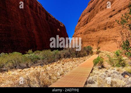 Olgas, Kata-Tjuta National Park, Northern Territory, Australia - 22 Sep 19: Walpa Gorge Walk through the Olgas is an iconic part of outback Australia. Stock Photo