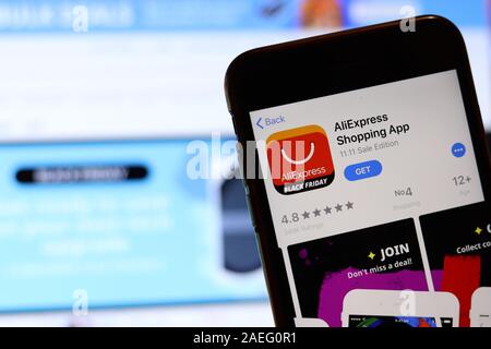 Los Angeles, California, USA - 26 November 2019: AliExpress Shopping App icon on phone screen with logo on blurry background, Illustrative Editorial. Stock Photo