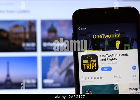 Los Angeles, California, USA - 26 November 2019: OneTwoTrip icon on phone screen with logo on blurry background, Illustrative Editorial. Stock Photo
