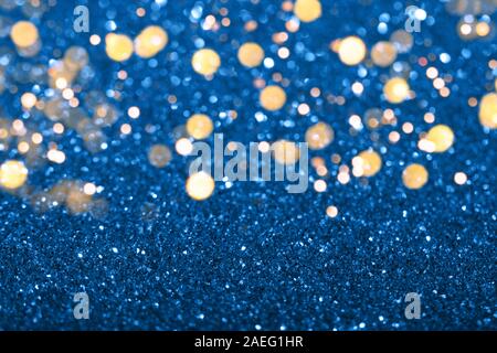 Blue festive background with sparkles in the bokeh. The concept of the celebration, the day of St. Valentine, New Year, birthdays, ceremonies, events, etc. Stock Photo