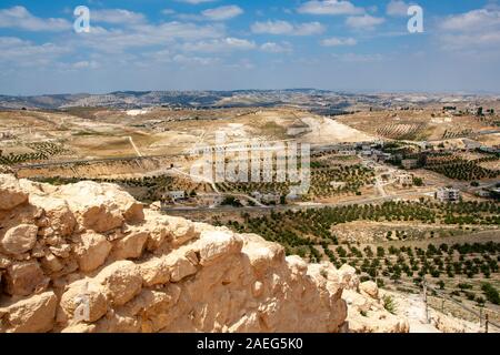 Israel, West Bank, Village in the Judaea desert, as seen from Herodion a castle fortress built by King Herod 20 B.C.E. Stock Photo