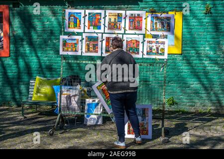 Street Artist and paintings, La Boca, Buenos Aires, Argentina, South America Stock Photo