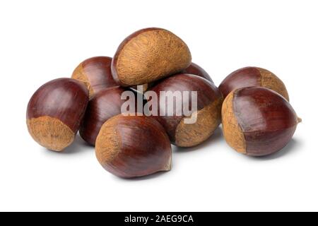 Heap of whole sweet chestnuts close up isolated on white background Stock Photo