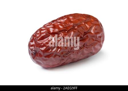 Single dried Chinese red date close up isolated on white background Stock Photo