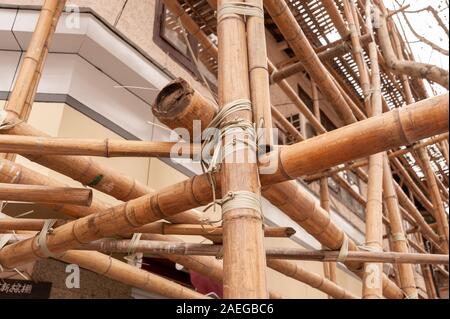 Bamboo scaffolding on a construction site, Shanghai, China Stock Photo