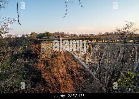 The Victoria Falls Bridge marks the border between Zambia and Zimbabwe in Southern Africa Stock Photo