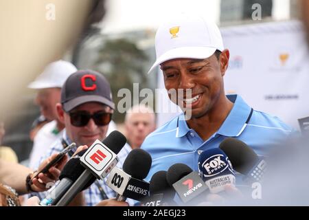 Melbourne, Australia. 9th Dec, 2019. Tiger Woods (C) speaks to the press ahead of the 2019 Presidents Cup in Melbourne, Australia, Dec. 9, 2019. Credit: Bai Xuefei/Xinhua/Alamy Live News Stock Photo