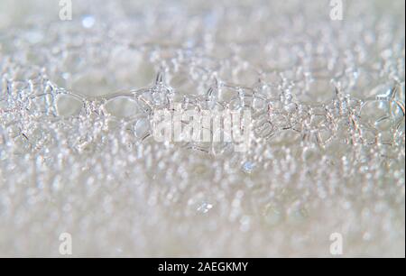 Background of white foam soap bubbles, detergent, shampoo, soap Stock Photo