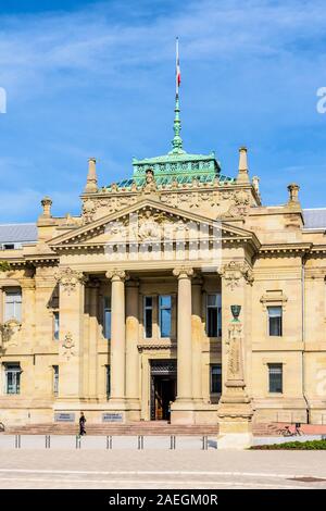 Close-up of the portico with ionic columns of the Palais de Justice, a neo-Greek palace built under the German Empire, which houses the high court. Stock Photo