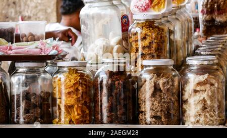 A traditional and popular dessert in Colombia made by coconut called cocadas. Stock Photo