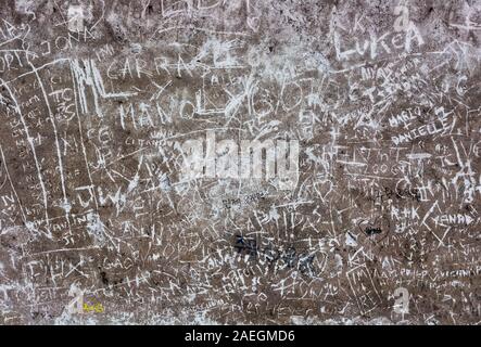 Rome, Italy - Oct 05, 2018: Vandal inscriptions on the wall of the ancient Forum in Rome Stock Photo