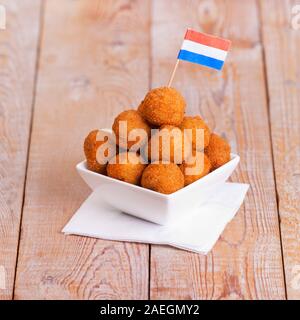 'Bittergarnituur' - Dutch deep fried snacks, usually enjoyed at the end of the afternoon with a couple of drinks, in company of friends. Stock Photo