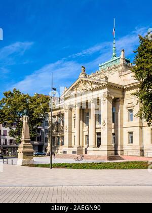 Facade and portico with ionic columns of the Palais de Justice, a neo-Greek palace built under the German Empire, which houses the high court. Stock Photo