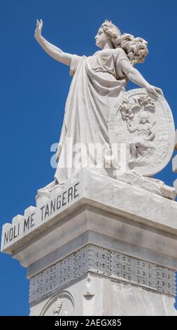 Closeup of a statue in front of the entrance of old town  in memory of those who fought for independence. Noli me tangere means don't touch me. Stock Photo