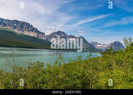 Morning view of the Wynn Mountain with reflection and Lake Sherburne at ...