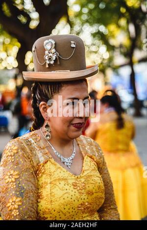 Valencia, Spain - February 16, 2019: Aymara woman wearing traditional rural Bolivia dress with hat during a parade. Stock Photo