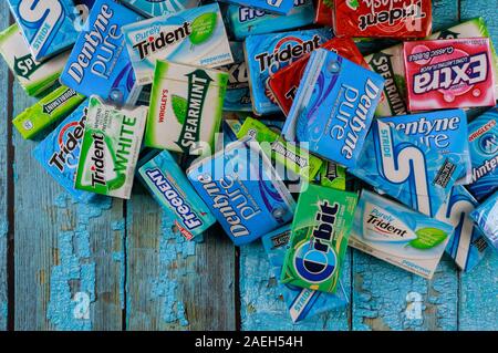 New York NY NOV 29 2019: Brands Orbit, Extra, Eclipse, Freedent, Wrigley, Spearmint Tident Stride Stride various brand chewing gum Stock Photo