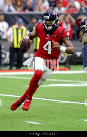 December 8, 2019: Houston Texans quarterback Deshaun Watson (4) gets the  ball past the goal line for a touchdown while being defended by Denver  Broncos strong safety Will Parks (34) during the