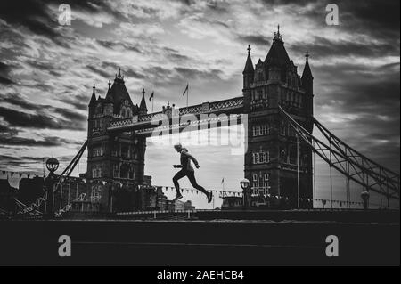 Silhouette of runner and Tower bridge in London. Concept photo for running competition in London as London marathon Stock Photo