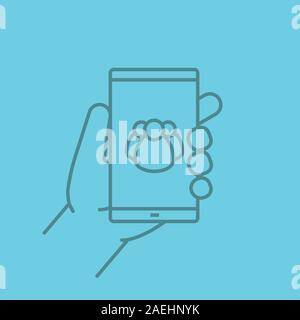 Hand holding smartphone color linear icon. Smart phone contacts. Thin line contour symbols on color background. Vector illustration Stock Vector