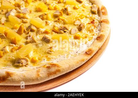 Pizza close up. Photo of pizza isolate on stand with blank space from side. Stock photo. Stock Photo