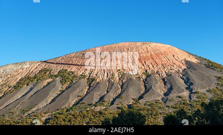 volcanic structure of the vulcano mountain on blue sky background, aeolian islands, italy Stock Photo