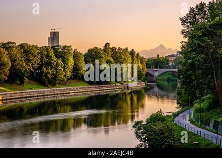 Turin by night. The first capital of the Kingdom of Italy shows its beauties, its historical squares and sunsets over the Po river Stock Photo