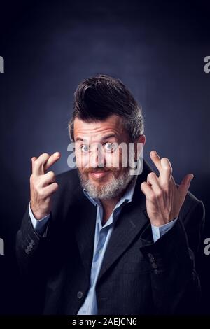 bearded business man emotions successful light background Stock Photo