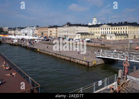 Elevated view from Allas Sea Pool across South Harbour  towards outdoor market in Kauppatori Market Square,Government Buildings with the Supreme Court Stock Photo