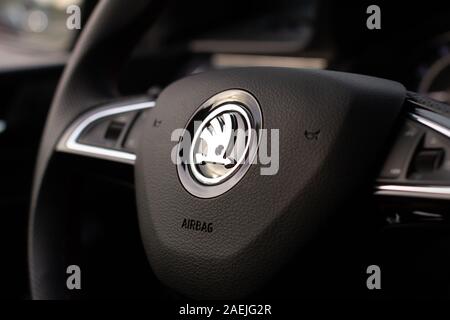A Skoda logo on the steering wheel of a Rapid Monte Carlo - Mlada Boleslav, 01.12.2019, Stock Photo