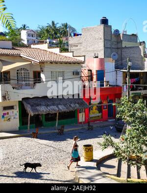 Street scene in Sayulita, Nayarit, Mexico. Sayulita is a popular destination for surfers, tourists, and expatriates. Stock Photo