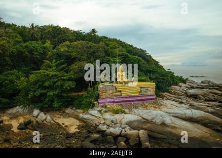 Gold Buddha statue on the Island near to Phuket, Drone flight Stock Photo