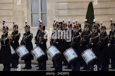 Paris, France. 09th Dec, 2019. The French Honour Guard of the French Republic wait for the arrival of world leaders attending the Normandy Format Summit at the Elysee Palace December 9, 2019 in Paris, France. The Normandy Format Summit in an effort to find an end to the war in Ukraine. Credit: Alexei Nikolsky/Kremlin Pool/Alamy Live News