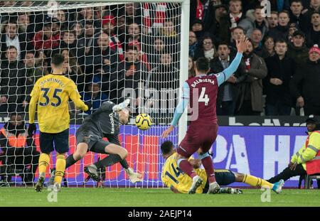 London, UK. 09th Dec, 2019. Pierre-Emerick Aubameyang of Arsenal scores his teams 3rd goal during the Premier League match between West Ham United and Arsenal at the Olympic Park, London, England on 9 December 2019. Photo by Andy Rowland. Credit: PRiME Media Images/Alamy Live News Stock Photo