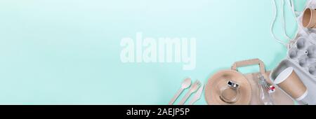 Sustainable eco friendly concept. Kitchenware on a teal background. Stock Photo