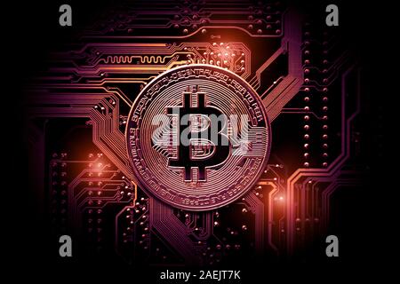 Bitcoin cryptocurrency, virtual money, blockchain technology. Coin on circuit board as microprocessor concept. Stock Photo