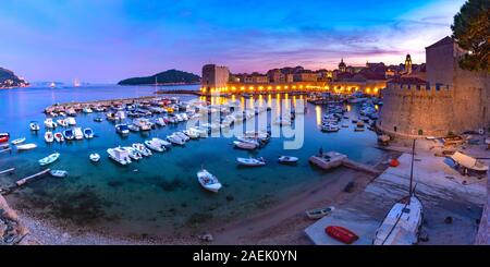Panoramic view of The Old Harbour and Fort St Ivana at sunset in Dubrovnik, Croatia Stock Photo