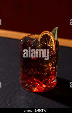 Negroni, an italian cocktail, an apéritif, first mixed in Firenze, Italy, in 1919. Count Camillo Negroni asked to strengthen his Americano with gin Stock Photo