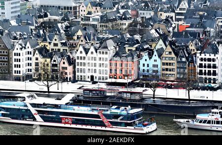 view of the snow-covered cologne old town on a cold january day Stock Photo