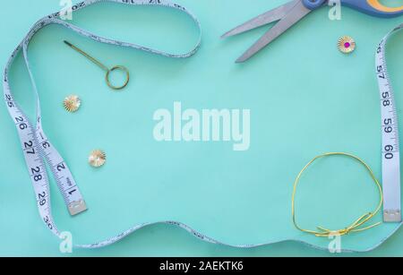 Sewing and Crafts Flat Lay on Green Background with Space for Text or Logo Stock Photo