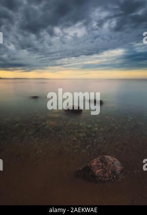 Rocks on the waters of Georgian Bay at Awenda Provincial Park in Ontario, Canada Stock Photo