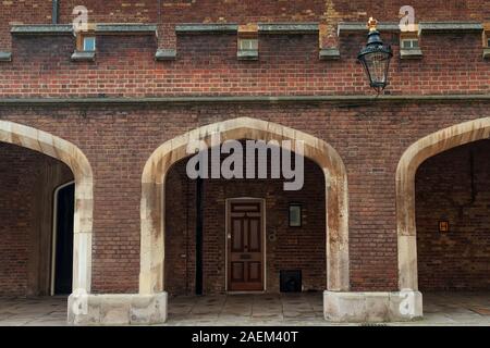 A small door leading to one of the Royal Residences of London, United Kingdom. The door is pretty modest when you think of the house it belongs to. Stock Photo