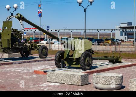 Leninsk Kuznetsk, Russia - 05.03.2019: Military equipment on the monument in honor of the memory of the war, tanks and green guns on a clear summer da Stock Photo